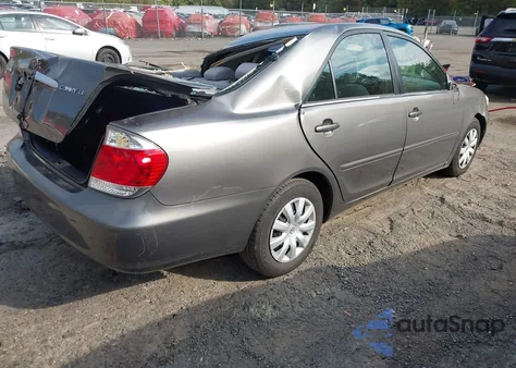 2005 Toyota Camry Le z USA, uszkodzony, nr VIN 4T1BE32K65U626030